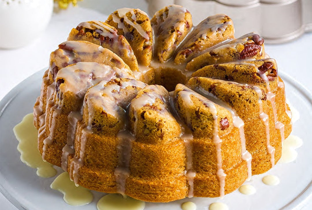 Christmas rum cake with glaze on a serving plate