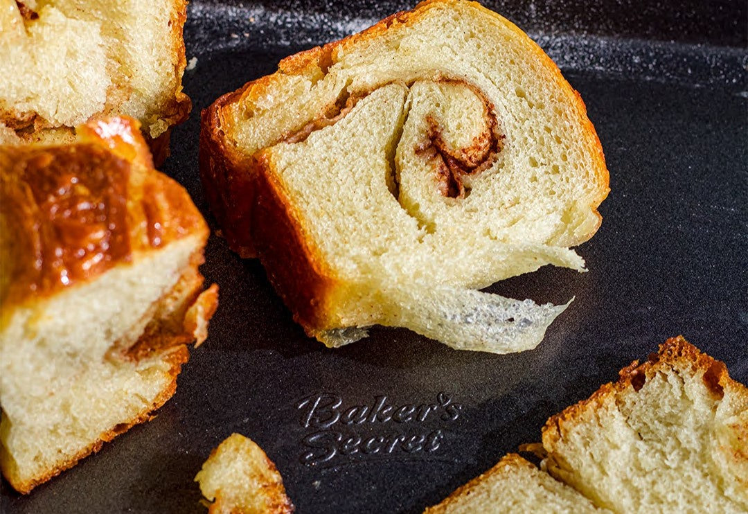 Slices of swirled cinnamon croissant loaf