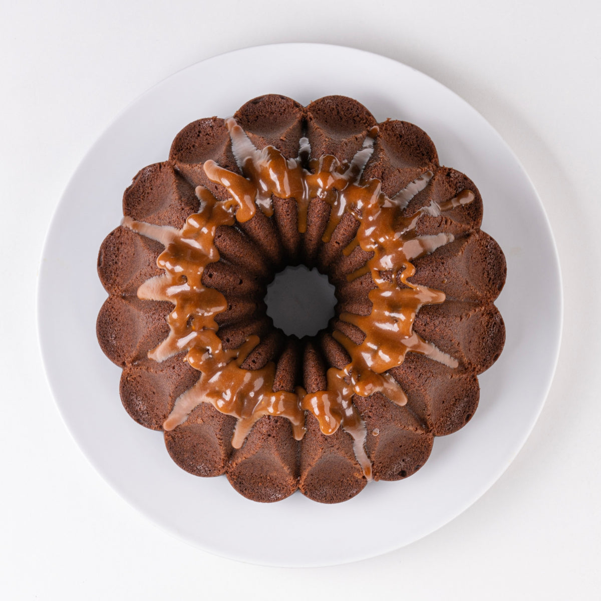 Chocolate fluted cake with caramel drizzle, top view