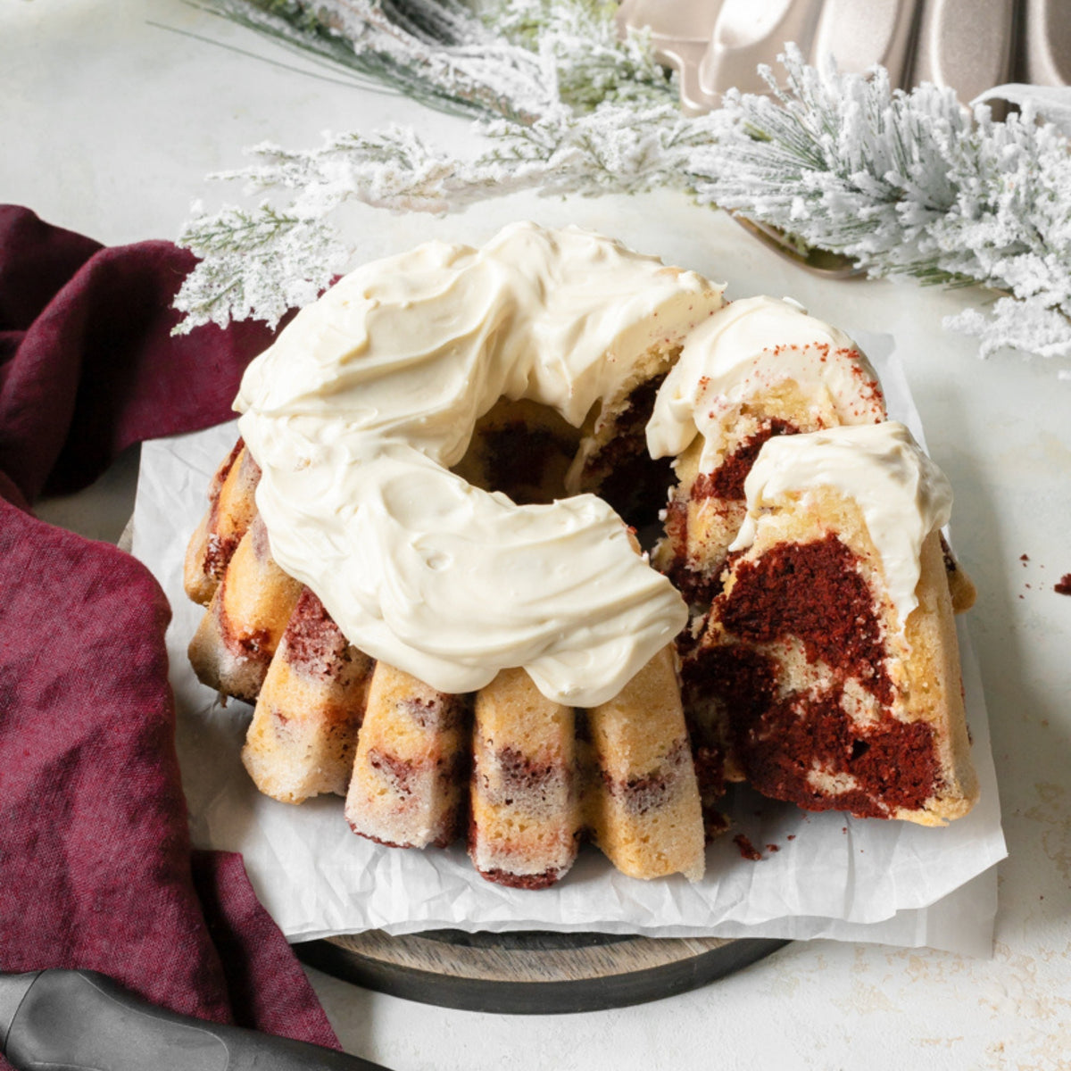 Sliced red velvet fluted cake with cream cheese frosting