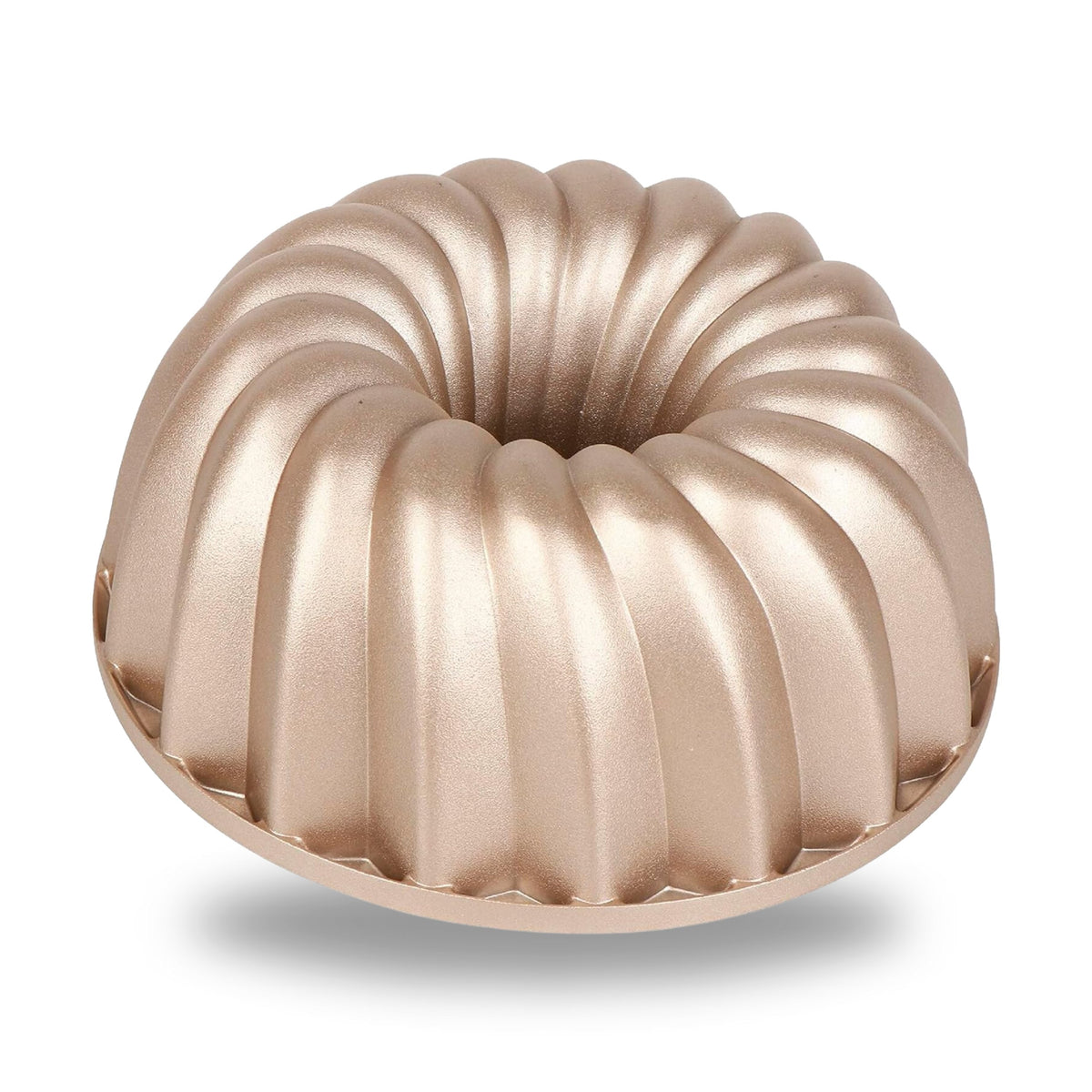 Classic cast aluminum fluted tube pan with a swirl design, champagne gold