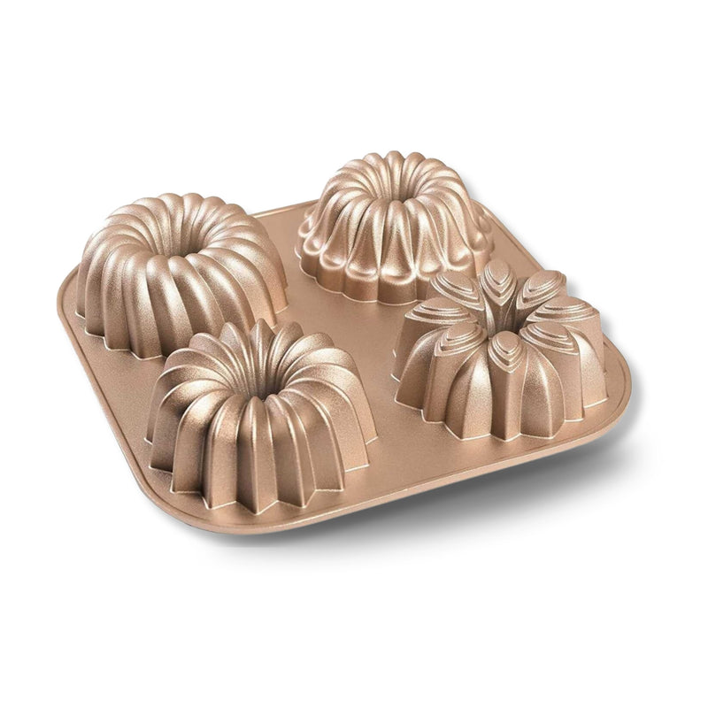Mini Joys 4-cavity mini fluted cake pan in champagne-gold cast aluminum