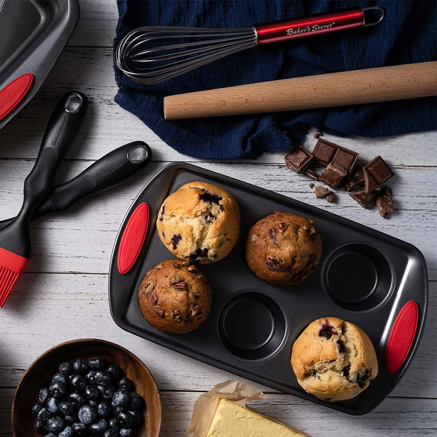 Muffins in a Baker's Secret muffin pan with chocolate and fruit